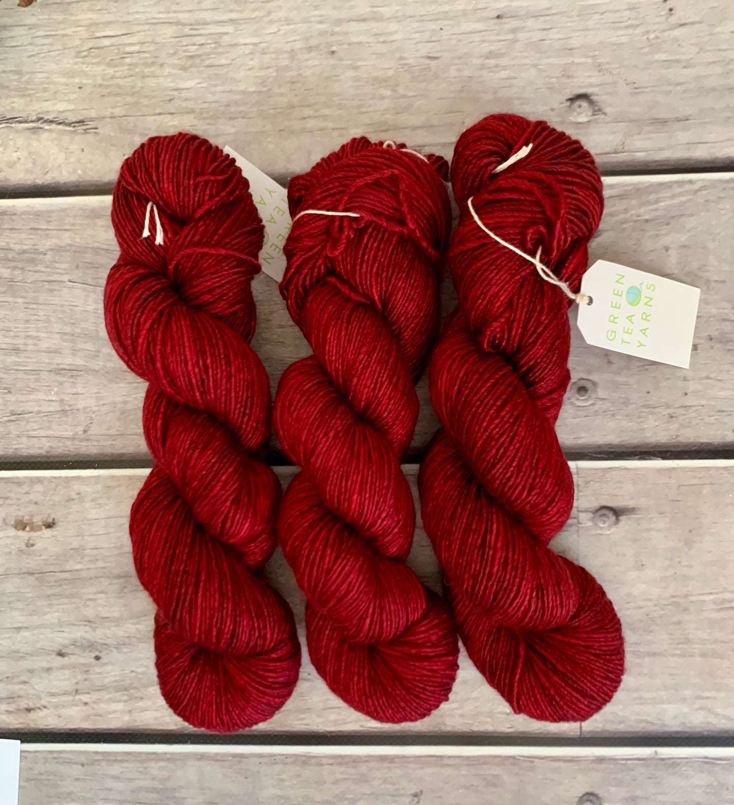 Dark Red Lacquer on Merino and Silk 8 ply single - Osmanthus 8