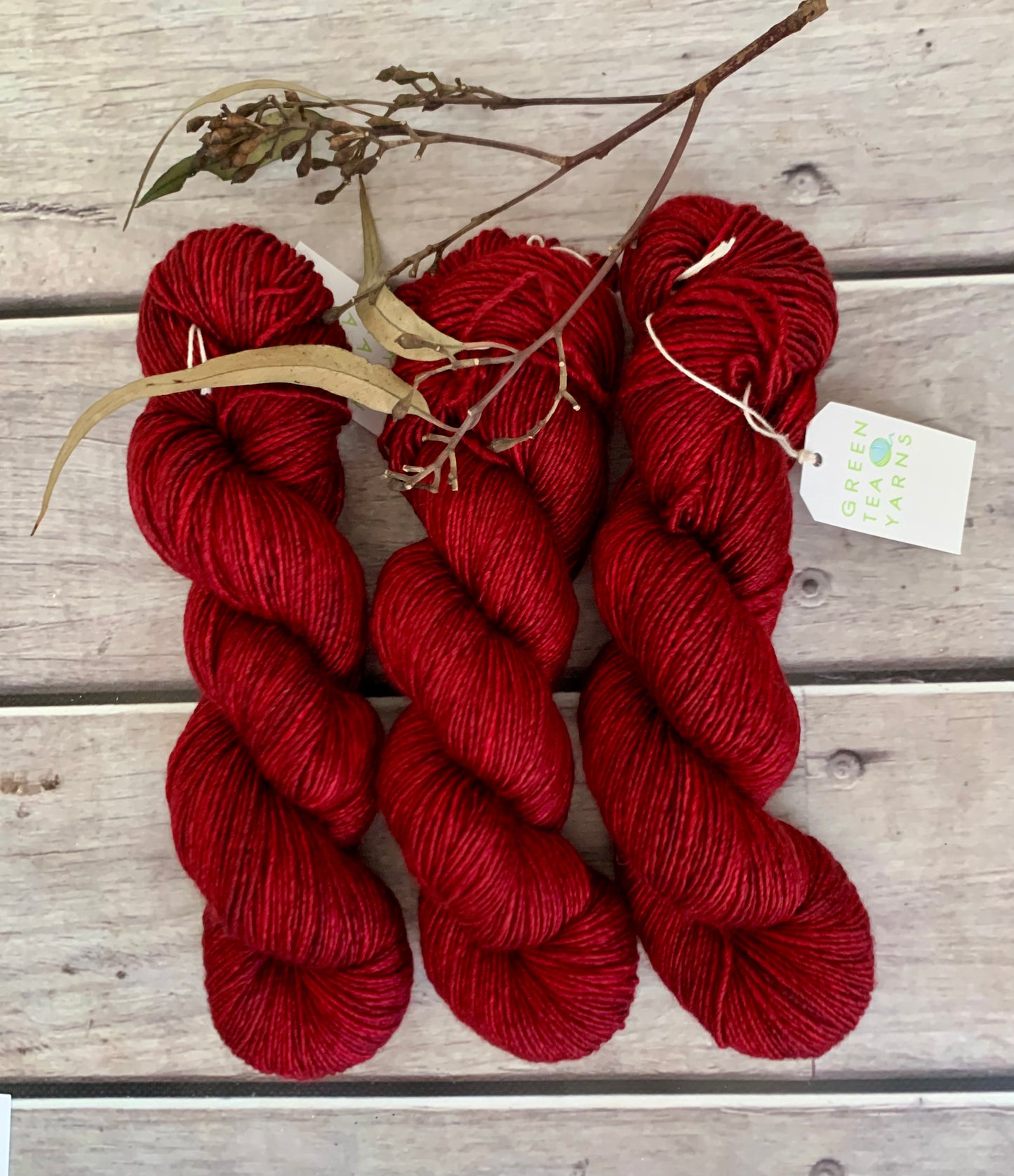 Dark Red Lacquer on Merino and Silk 8 ply single - Osmanthus 8